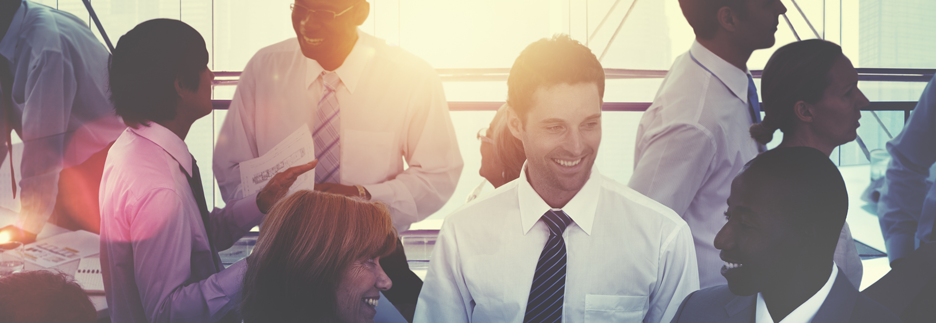 Professional reviewing documents for obtaining a work visa in Tajikistan in an office setting